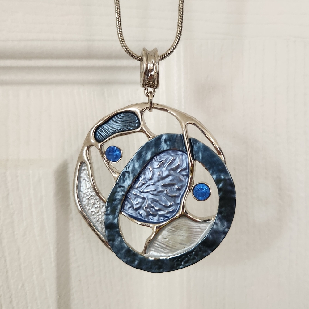 Howard's blue necklace/pendant and earrings set